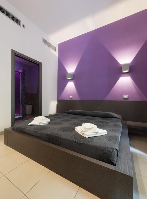 Chroma Suites Номер фото